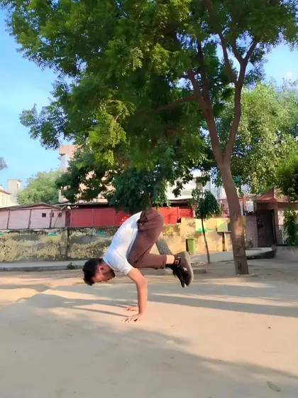 Here I demonstrate the benefits of Bakasana (Crow Pose). This yoga asana improves balance, concentration, and strengthens the arms, shoulders, and core.