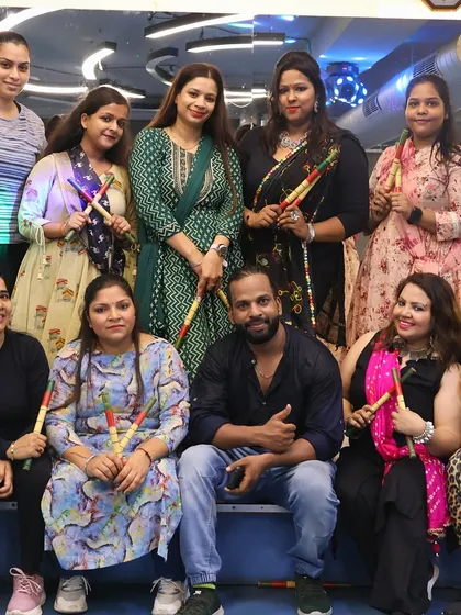 Another angle of our happy crew during the Navratri Dandiya celebration.