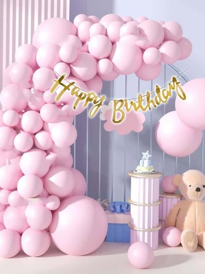 This all-pink balloon arrangement is perfect for a princess or themed birthday party. I use balloons of different sizes to create a full, cloud-like effect that looks great in photos.
