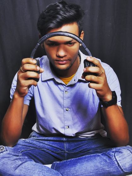 A pensive moment with my headphones. This is where the ideas for my next big set begin.