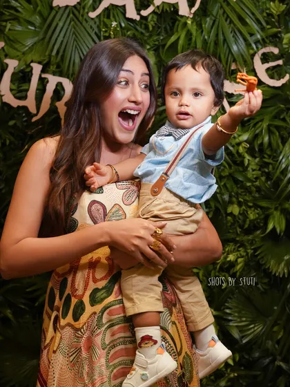 This is the magic I live to capture. A moment of pure, unscripted joy between a loving aunt and her little nephew at his first birthday party. It’s these connections, the laughter, and the love that I turn into timeless family treasures.