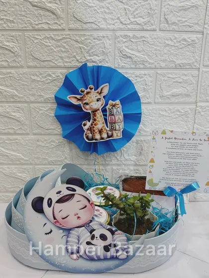 The same adorable pram hamper design, but in blue for a baby boy's arrival.
