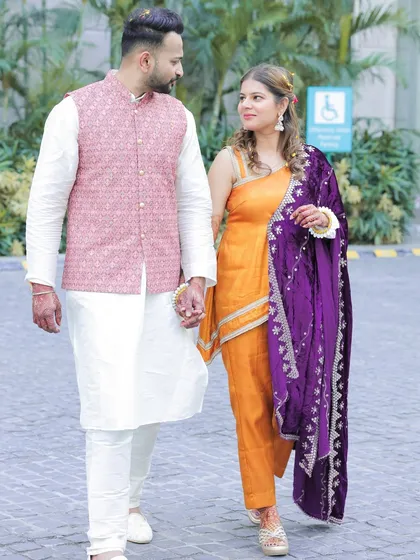 A lovely portrait of the couple during their Haldi ceremony, showcasing their coordinated traditional outfits.