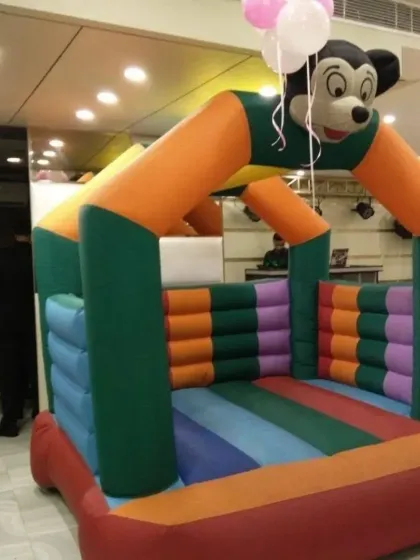 For fans of classic characters, I offer this fun Mickey Mouse bouncy castle. It's a great fit for indoor parties and brings a lot of color and excitement to the celebration.