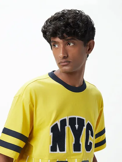 This Westside shoot required a natural look for the model, focusing on clean skin and styled hair to complement the casual, youthful clothing.