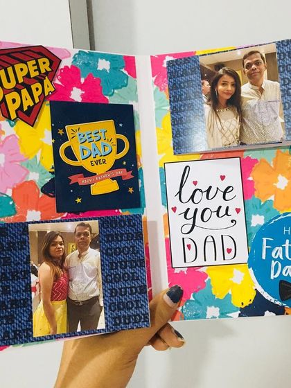 A special greeting card I made for Father's Day. It's decorated with "Super Papa" and "Best Dad Ever" signs and has space inside for your photos.