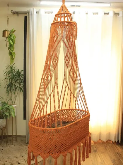 Another view of our baby swing, showing a different knot pattern. Each piece is unique and handmade with love, ensuring the best for your baby.