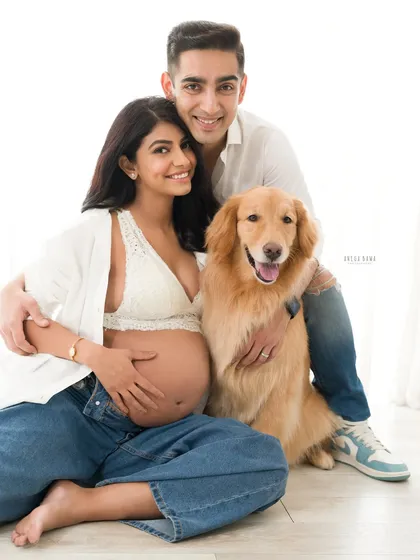 A complete family portrait, fur baby included. This relaxed studio session shows how we can incorporate everyone you love into your maternity photos for a truly personal memory.