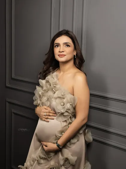 Pregnancy is a miracle in motion. Here, we captured the grace and pure anticipation of a mama-to-be in a beautiful, handcrafted floral gown.
