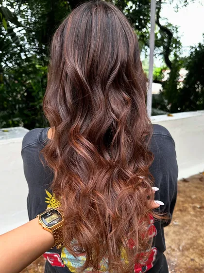 Getting her ready for a work trip with a professional yet stylish look. These 'Almond Brown' tresses are chic and sophisticated, with just enough color to feel fresh and confident.