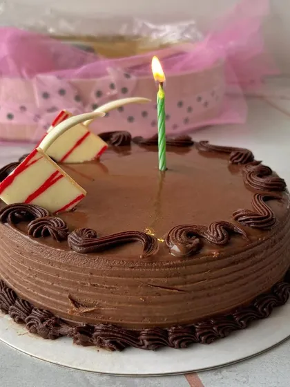 Sometimes, a simple, classic chocolate cake with a single candle is all you need to make a birthday wish come true. We bake these fresh for your special moments.