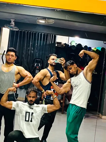 Another shot of our 'bhailog' celebrating their hard work. The camaraderie and positive energy you see here are what make our gym a place where people love to train.