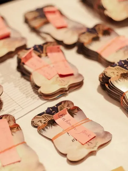 For a destination wedding, I created these custom luggage tags for guests. It's a small, thoughtful detail that serves as both a practical item and a lovely keepsake.