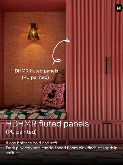 Pink can also be bold. These dark pink HDHMR fluted panels on the wardrobe balance bold color with soft texture, finding strength in softness.