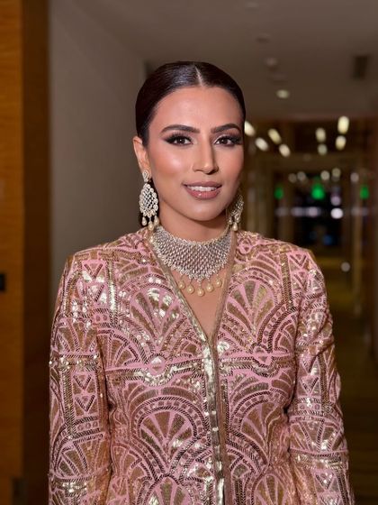 Dripping in rose gold. This engagement look features a stunning rose gold glitter eye, my signature winged liner, and a sleek low ponytail for a modern and chic vibe.