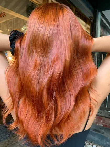 Fabulous auburn hair. This global color is a beautiful, warm red-brown that was achieved with bleach for maximum vibrancy.