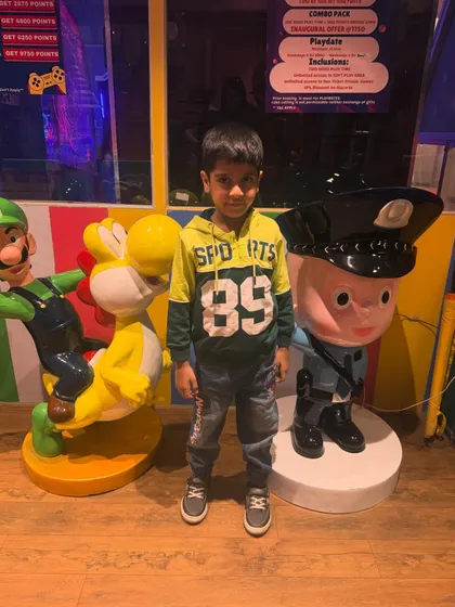 Posing with some familiar friends. Our character statues, like Mario and Yoshi, make for great photo opportunities and add to the playful atmosphere.