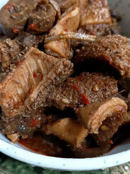 This is a special preparation of pork innards, cooked with red chili and spices. It's a dish for those who appreciate the full range of traditional Northeast flavors.