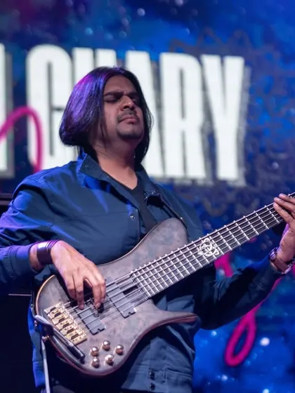 The incredible Sheldon D'Silva on bass guitar during our Ravi Chary Crossing performance. His foundation allows the sitar to soar.