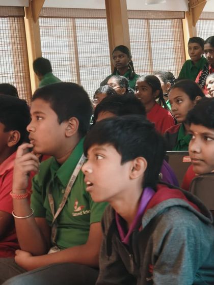The captivated faces of a young audience watching a performance by our Vyoma Kids. It's a powerful experience for our students to see the impact of their storytelling on others.