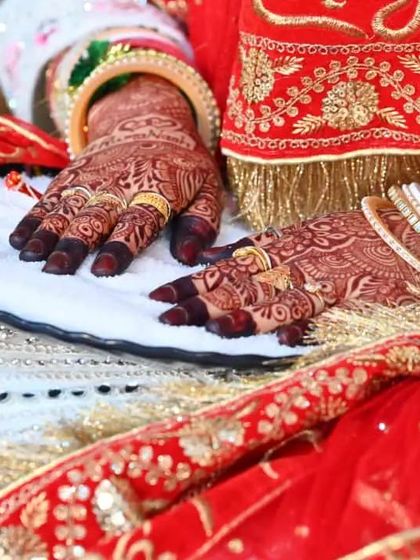 A beautiful shot from a wedding ritual, highlighting the bride's dark and detailed henna. This is the result of pure, natural henna and proper aftercare.