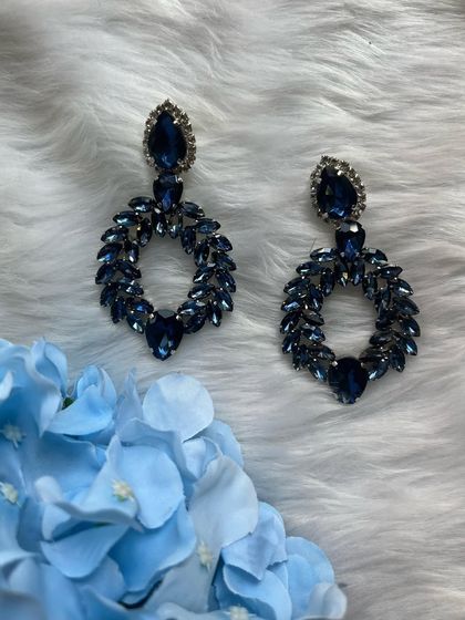A closer look at the blue crystal hoop earrings. These sold out quickly, but I'm always looking for new, stunning designs for you.