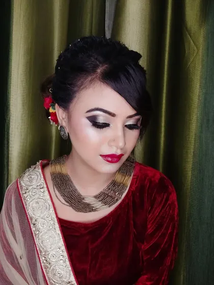The complete look is perfect for any festive occasion or wedding party.