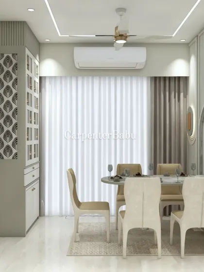 This dining area uses a patterned crockery cabinet and a simple dining set to create a look that is both functional and stylish.