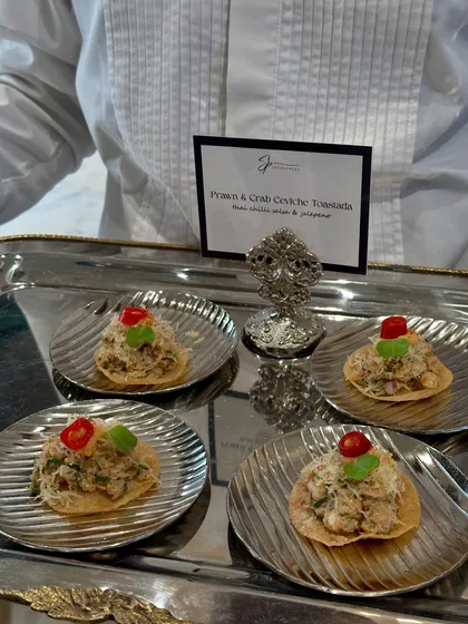Prawn & Crab Ceviche Tostada, served on elegant silver platters by our professionally dressed staff for a formal BCCI event.