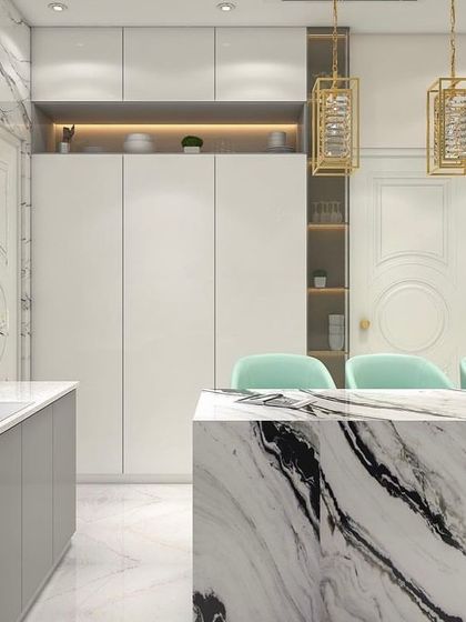 A bright, modern kitchen with a large panda marble island. The design features white and grey cabinets, gold pendant lights, and plenty of storage.