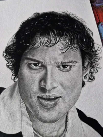 A tribute portrait of the popular singer Zubeen Garg, capturing his intense gaze.