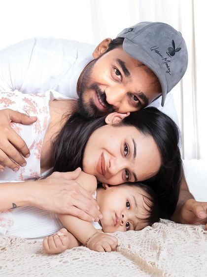 A classic family cuddle pile. This pose is always a favorite for showing the closeness and love within a family.