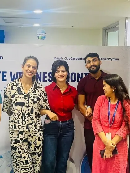 The whole group together at Marsh McLennan. These sessions are more than just a workout; they are a fun team-building activity that improves workplace culture.