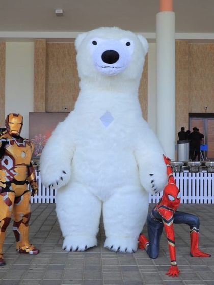 An unlikely team-up! Our Iron Man and Spiderman mascots pose with a giant Polar Bear, showing how we can mix and match characters for a unique and fun event.