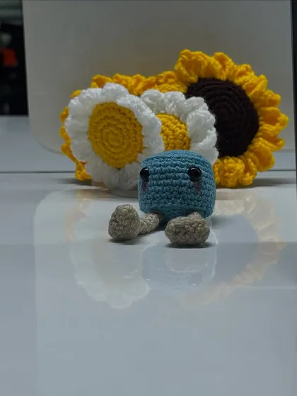 Another beautiful shot from a client. This little blue desk buddy is sitting among some handmade daisy and sunflower coasters I made.