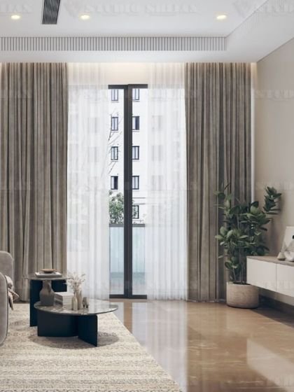 The TV and window side of the DLF bedroom, showcasing the simple, elegant console and the use of sheer and blackout curtains for light control.