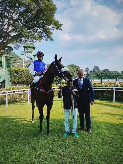 Aquastic, with jockey Akshay Kumar, after winning the memorial trophy.