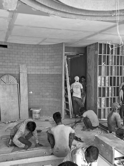 A work-in-progress shot from the Kohinoor lounge project on the 44th floor in Mumbai. This black and white photo captures the energy of the construction site as our vision for a luxury lounge takes shape.