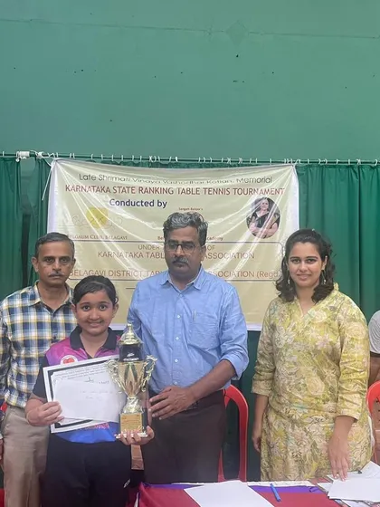 Rashi V with her trophy for finishing as the Runner-Up in the Under 13 Girls singles at the Belgaum state ranking tournament.