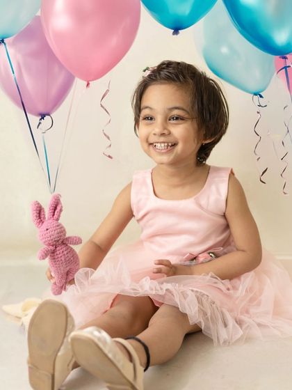 Simple, classic, and full of joy. A session with colorful balloons is a timeless way to capture the playful spirit of a birthday celebration.