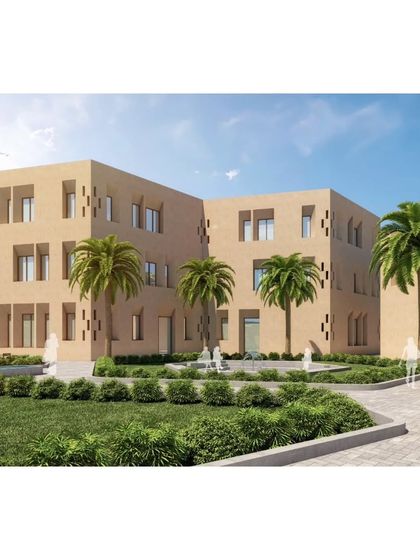 Another view of the landscaped courtyards at Qism Al Tahfeez, designed to be peaceful spaces for reflection and community.