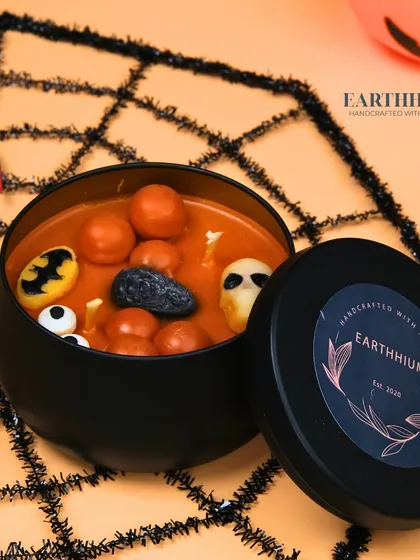 Getting spooky for Halloween with my themed tin jar candles, filled with skulls, bats, and eyeballs!
