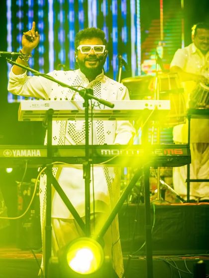 Our keytarist engaging the crowd at a private club event. We love bringing our energy to exclusive gatherings.