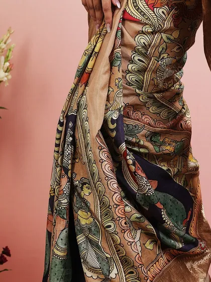 Another detailed shot of the beautiful narrative print on this unique saree.