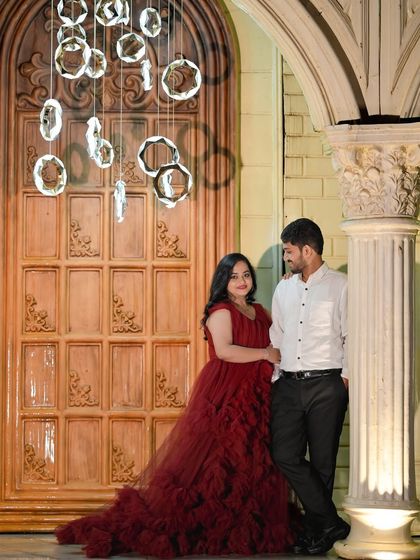 Another angle of the grand door with hanging lights, showing its versatility for different couple poses.