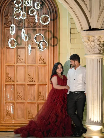 Another angle of the grand door with hanging lights, showing its versatility for different couple poses.
