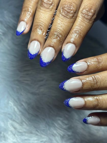 The reflective glitter in this blue polish really sparkles in the light.