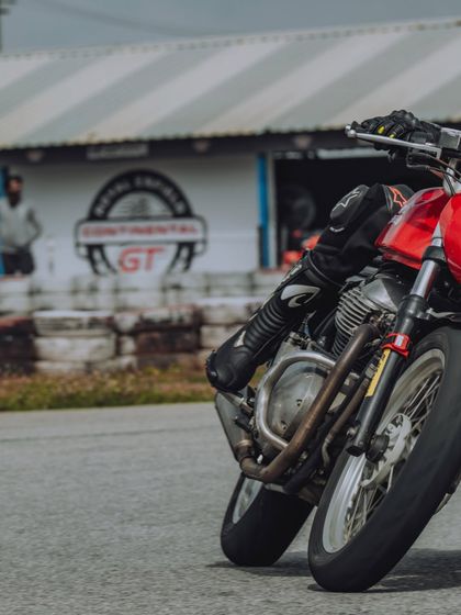 A close-up shot of a Royal Enfield GT 650 leaning into a corner at the Bangalore Zonal Selection.