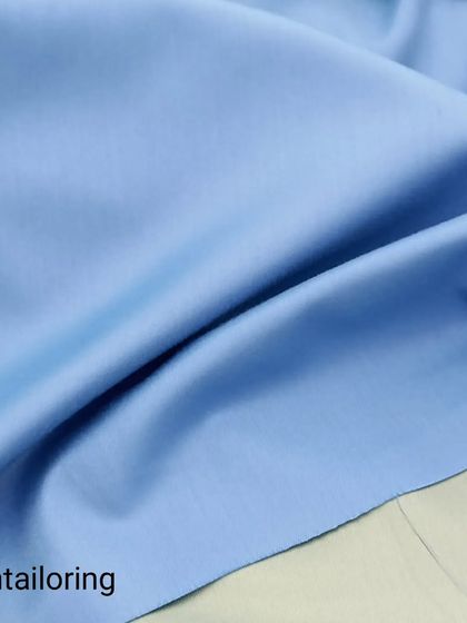 A light blue Terrycot fabric, perfect for a classic saya kurta. The material has a smooth finish and drapes beautifully.