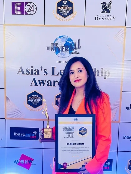 Proudly holding my award for "The Most Trusted Dermatologist of the Year (Delhi/NCR)" at the Asia's Leadership Awards 2023.